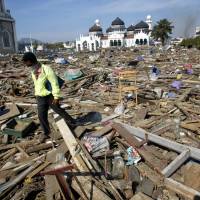 Aceh, Indonesia on Dec. 27, 2004, a day after a massive earthquake ...