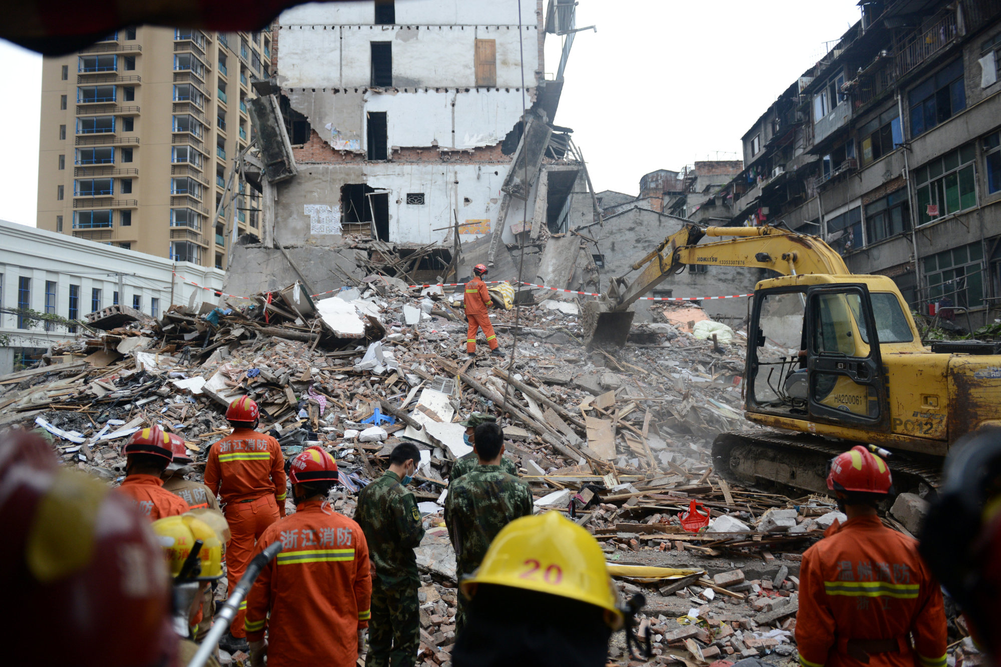 At least 20 reported killed as migrantpacked buildings in China