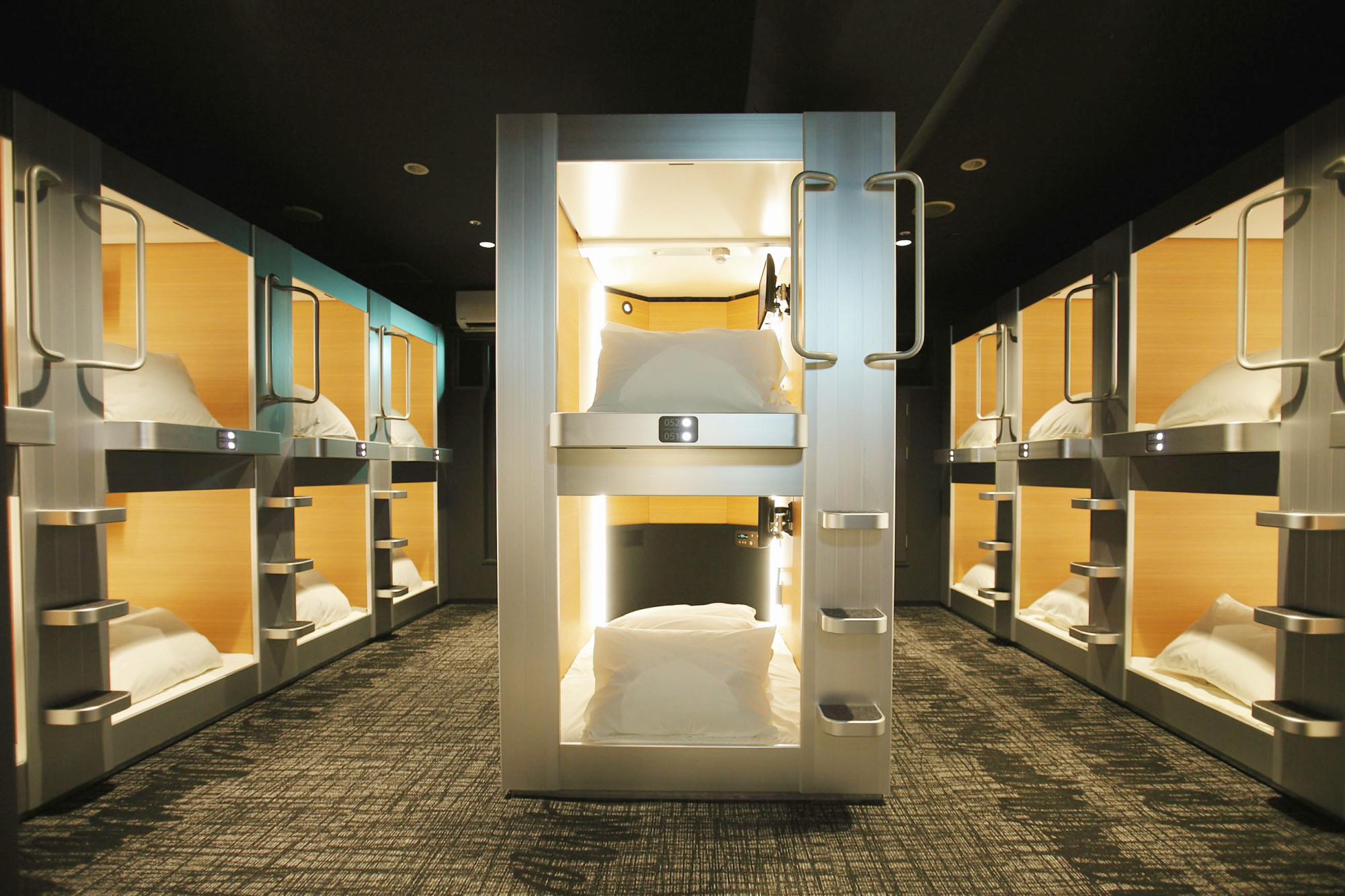 Once aimed at salarymen, Japan's new capsule hotels reach out to