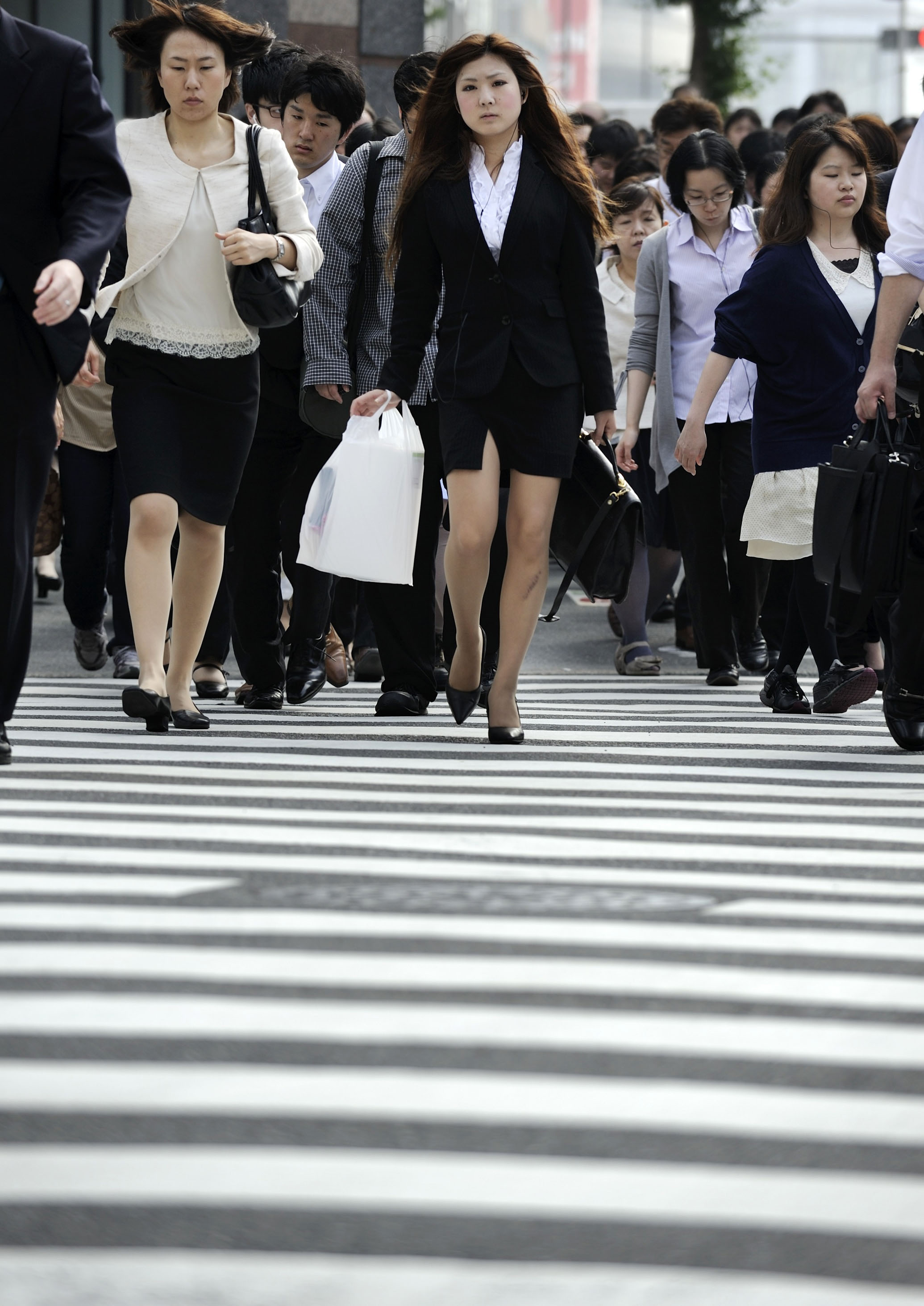 Women hold just 3.4% of exec positions at listed Japan firms, far from