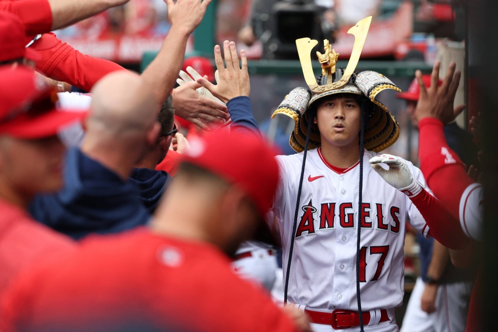 Ohtani gets the win, ties for the MLB HR lead as the Angels beat