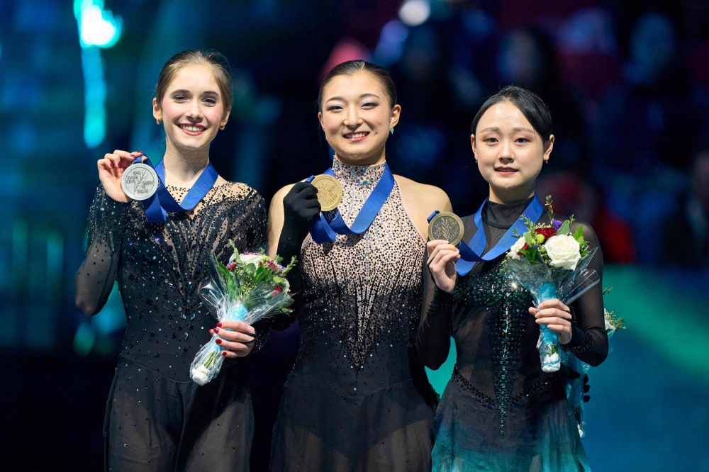 Sakamoto wins gold in Montreal to become 1st woman to 3-peat as world  champion since 1968