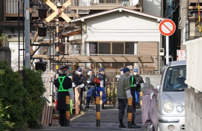 Tokyo police arrest four men on suspicion of staging colleagues suicide