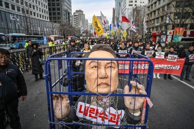 South Korea investigators seek arrest warrant for Yoon over martial law