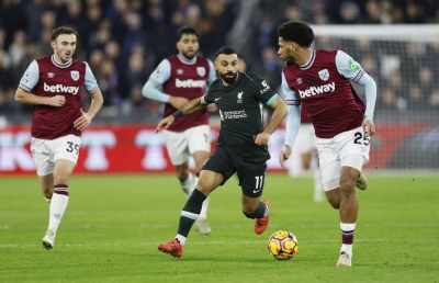 Five-star Liverpool pull eight points clear with West Ham rout