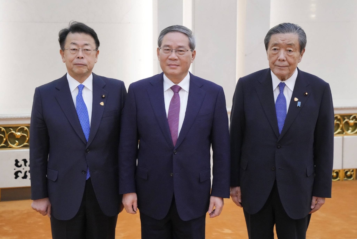 Japan ruling party execs and Chinese premier agree to seek stable ties