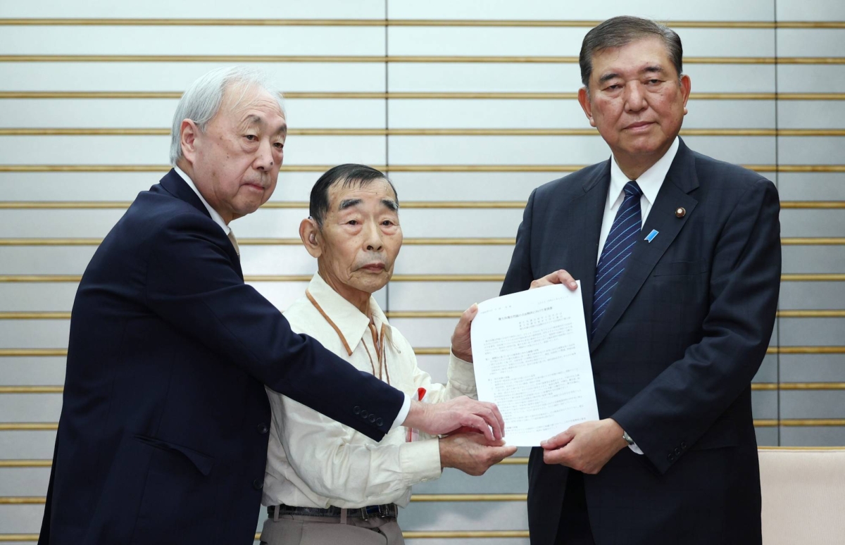 Japan enacts compensation law for forced sterilization victims.