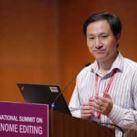 He Jiankui, a Chinese researcher, speaks during the Human Genome Editing Conference in Hong Kong Nov. 28. He made his first public comments about his claim to have helped make the world\'s first gene-edited babies. | AP