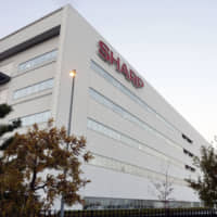 Sharp Corp.\'s group net profit in the April-September period fell 33.1 percent from a year earlier to &#165;27.4 billion, the company\'s financial results released Friday show. The firm attributed the adverse results to weak TV sales in overseas markets. | KYODO