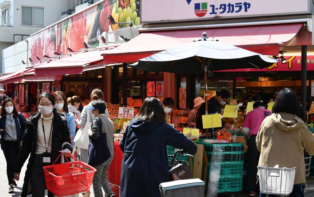 Tokyo shoppers rush out after governor’s call to stay in to curb virus ...