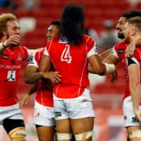 Sunwolves players celebrate after scoring a try against the Stormers during a Super Rugby match on March 17 at National Stadium in Singapore. | REUTERS