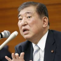 Shigeru Ishiba, former secretary general of the Liberal Democratic Party, makes a speech at Kyodo News in Tokyo on Thursday. | KYODO