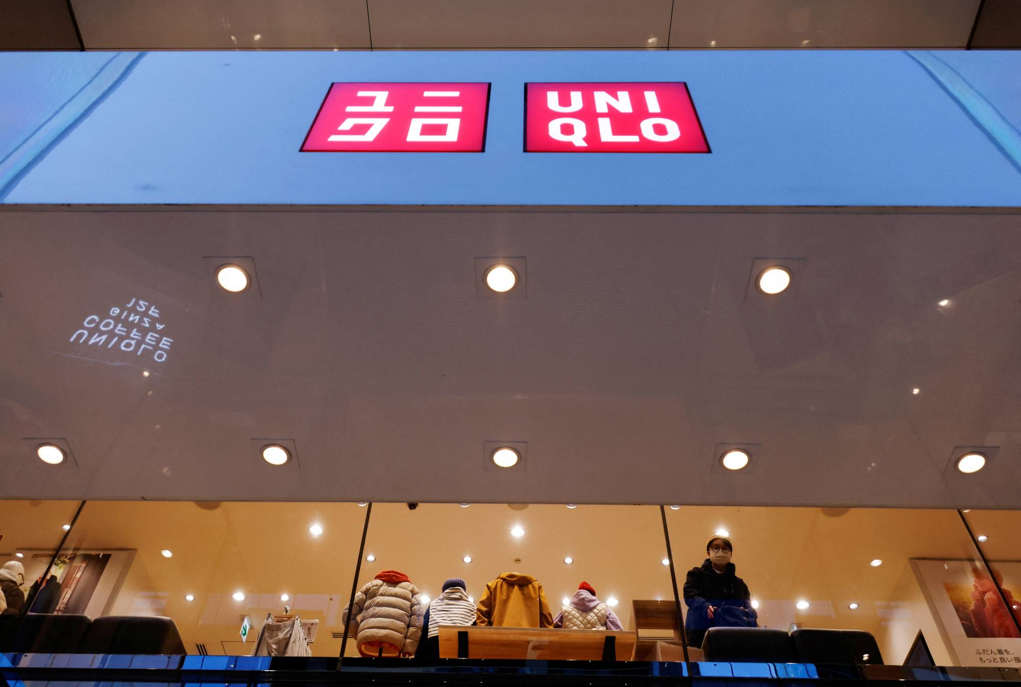 Uniqlo owner sticks to forecast while seeking to raise wages - The