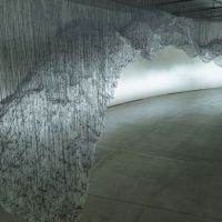 Yasuaki Onishi\'s, \"Reverse of Volume\" involves billowing sheets suspended from the ceiling by  masses of threa | PHILIP BRASOR