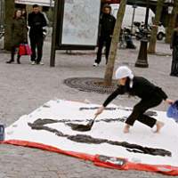 Calligrapher Kaori Tsukikaze will be decorating some canvases at Tokyo\'s La Fabrique club on June 22. | ANGELA JEFFS PHOTO