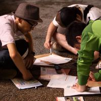 Fair game: People gather at last year\'s Real Dasshutsu (Escape) Game at Yomiuri Land in Inagi, Tokyo. | (C) 2011\"KITSUTSUKI TO AME\" FILM PARTNERS (FAR LEFT); (C) 2011\"MITSUKO DELIVERS\" FILM PARTNERS