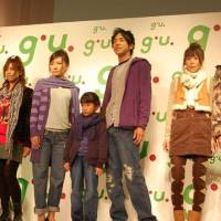 Cheap chic: Young people model outfits coordinated by popular TV personality Akina Minami for g.u., a clothing chain run by GOV Retailing Co., at a media event in Tokyo\'s Roppongi district Tuesday. | KAZUAKI NAGATA