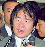 Economiy Minister Heizo Takenaka comments on gross domestic product figures released Friday. | PHOTO COURTESY OF ISOTECH CO.