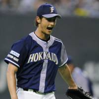 Stellar work: Fighters ace Yu Darvish pitches eight innings of one-run ball in his team\'s 3-1 win over the Chiba Lotte Marines on Sunday. | KYODO PHOTO