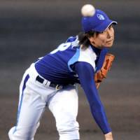 Historic shutout: Hyogo Swing Smileys right-hander Mika Konishi pitches a four-hitter against the Kyoto Asto Dreams on Friday in Kyoto. Hyogo defeated Kyoto 4-0 in the first game in Girls Professional Baseball League history. | KYODO PHOTO