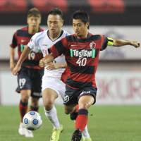 Leader of the pack: Kashima Antlers captain Mitsuo Ogasawara has been named J. League player of the year. | KYODO PHOTO