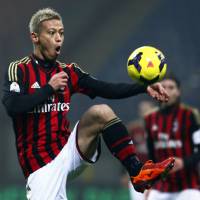 On target: Keisuke Honda controls the ball during AC Milan\'s 3-1 win over Spezia in the Italian Cup on Wednesday. | AP