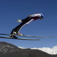 Soar like an eagle: Ski jumper Noriaki Kasai takes part in a normal hill training session on Friday in Rosa Khutor, Russia. | AFP-JIJI