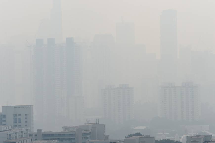 Singapore shrouded by blanket of smog as illegal forest fires burn in ...