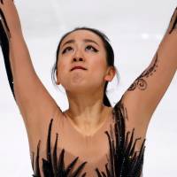 Mao Asada competes at the ISU Grand Prix of Figure Skating Trophee de France in November. | REUTERS