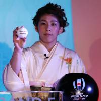 Olympic wrestling great Saori Yoshida participates in the 2019 Rugby World Cup draw on Wednesday. | REUTERS