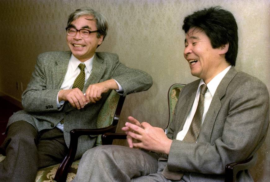 Isao Takahata (right) and Hayao Miyazaki speak in an interview in November 1990.