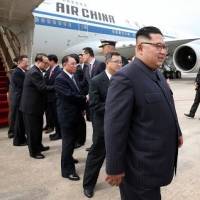 North Korean leader Kim, Trump both arrive in Singapore ahead of summit