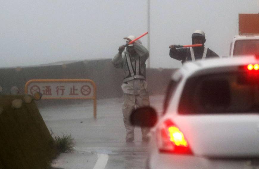 A road in Kushimoto, Wakayama Prefecture, is closed as Typhoon Jebi passes over the area Tuesday.