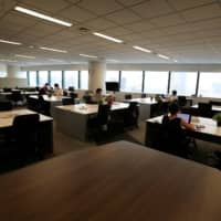 The majority of staff from an office at the headquarters of Fujitsu in Tokyo are working remotely amid the COVID-19 pandemic. | REUTERS