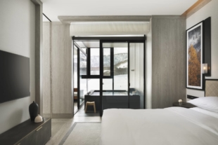 The Park Suite Deluxe Bedroom with Onsen offers views of the surrounding winter wonderland. | AARON JAMIESON