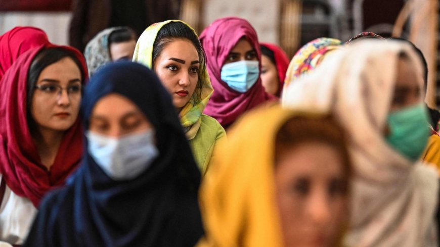 Afghan women's faces disappear online and in the street after Taliban  takeover | The Japan Times