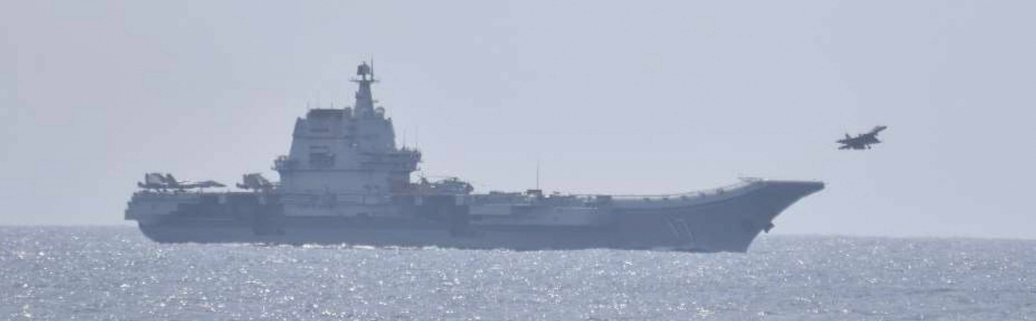 A fighter jet takes off from China's Shandong aircraft carrier south of Okinawa Prefecture in this image released Sunday. | JOINT STAFF OFFICE OF THE DEFENSE MINISTRY OF JAPAN / VIA REUTERS 