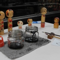 Visitors to the Ganguan Kokeshiya in the Akiu Craft Village can paint their own traditional wooden kokeshi dolls. | KERRY FURUKAWA