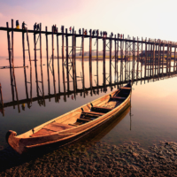 Built around 1850, U Bein Bridge near Mandalay is the world’s longest teak bridge. | MYANMAR MINISTRY OF HOTELS AND TOURISM