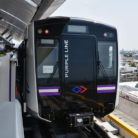 Thai officials prepare to board  a Japanese-built train for its first full trial run on Bangkok’s Purple Line on 
May 10, 2016. | KYODO