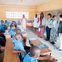 Students visit an elementary school in Cameroon as part of the social engagement program 'Learn from Africa.' | SOPHIA UNIVERSITY