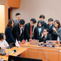 Participants hold an informal discussion during a break at the Model ASEAN Meeting Plus Japan conference in November 2023. | AJC