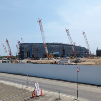 A new Rapidus chip plant is shown under construction in Chitose, Hokkaido, in May. | JIJI