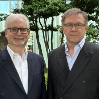 David Semaya (left), executive chairman and representative director of Sumitomo Mitsui Trust Asset Management, poses with Bodenheimer at an investor event on Aug. 26 at the Tokyo American Club.