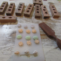 Local candy known as wasanbon are shown with the molds used to make them — an activity visitors are encouraged to try.