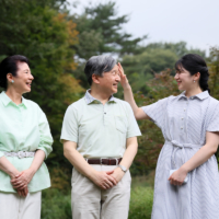 Empress Masako, Emperor Naruhito and their daughter, Princess Aiko, chat during a walk through the grounds of the Nasu Imperial Villa in Nasu, Tochigi Prefecture, on Sept. 12. | JIJI