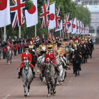 A procession for Emperor Naruhito, Empress Masako, King Charles III and Queen Camilla heads for Buckingham Palace through the Mall in London on June 25. | JIJI